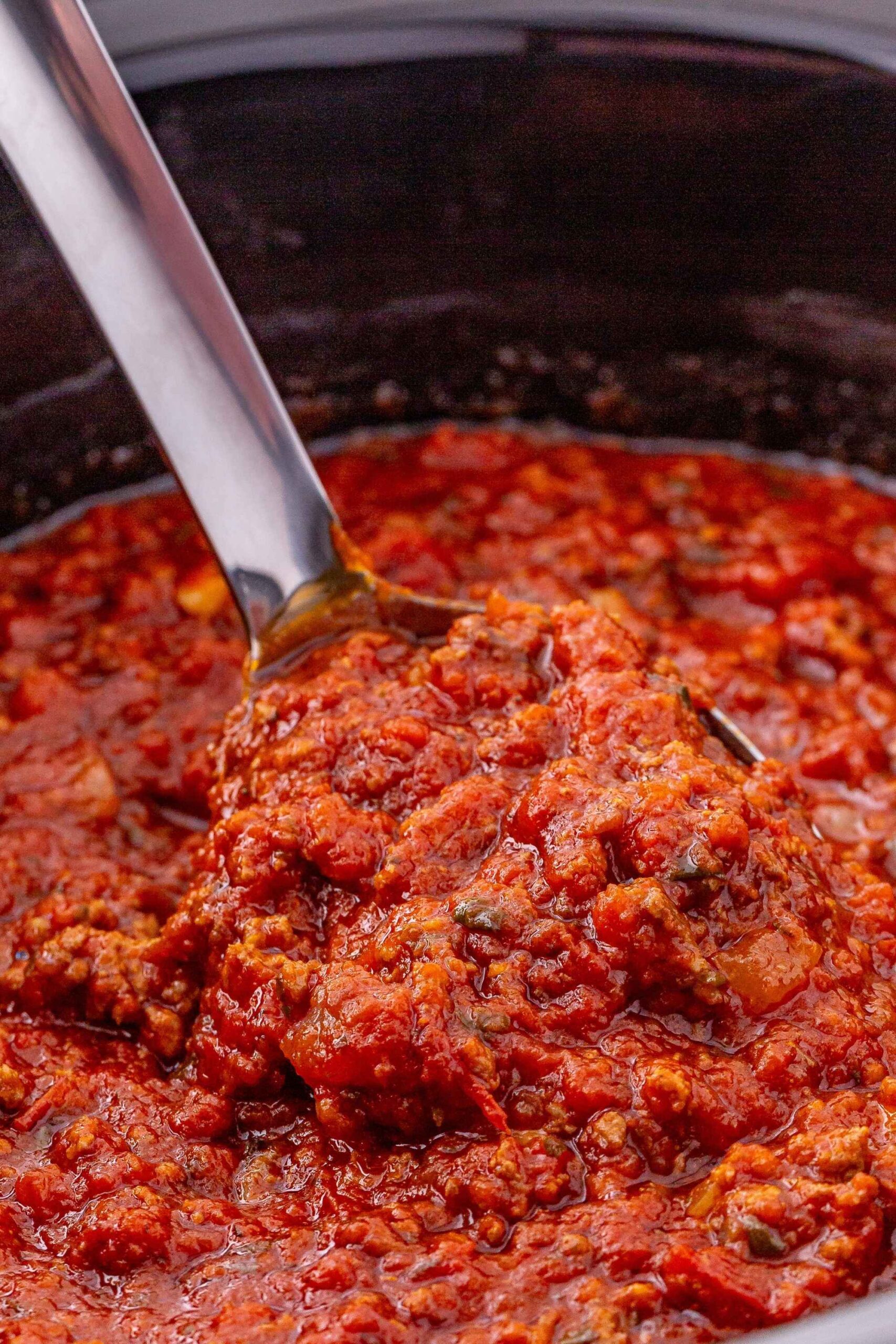 beef gnocchi sauce on spoon